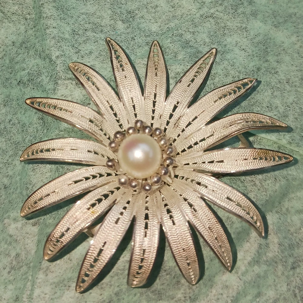 Elegant Silver Floral Brooch with Pearl Center